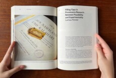 Hands holding a book open