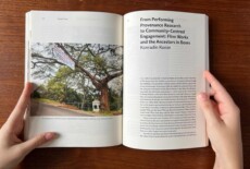 Hands holding a book open
