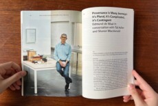 Hands holding a book open
